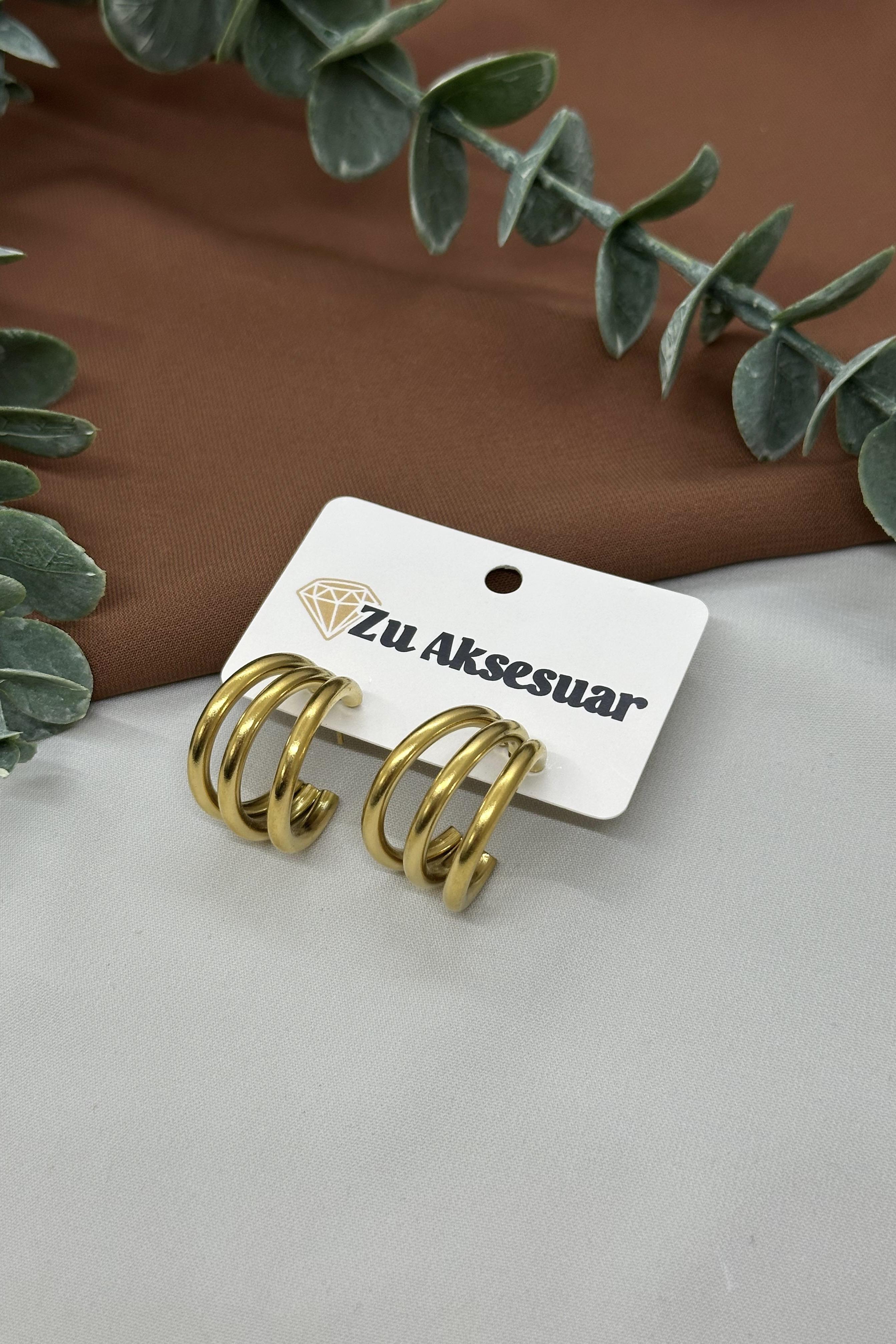 Çoklu Görünümlü Gold Çelik Küpe